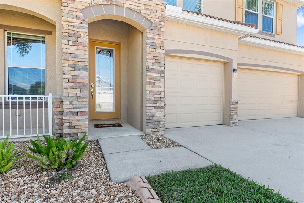 159 Star Shell Drive Apollo Beach, FL 33572 - Photo 16 of 57 a front view of a house with garden