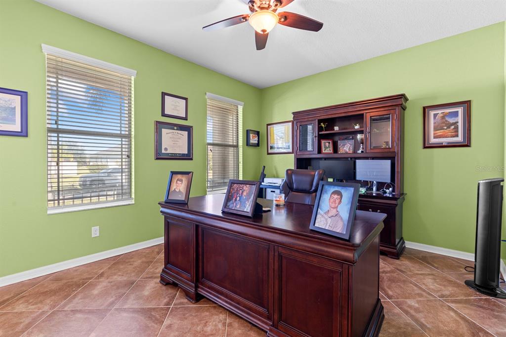 159 Star Shell Drive Apollo Beach, FL 33572 - Photo 18 of 57 a view of a workspace with furniture and a window
