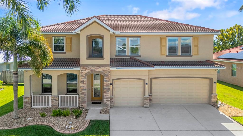 159 Star Shell Drive Apollo Beach, FL 33572 - Photo 2 of 57 a view of a house with a tub and a yard
