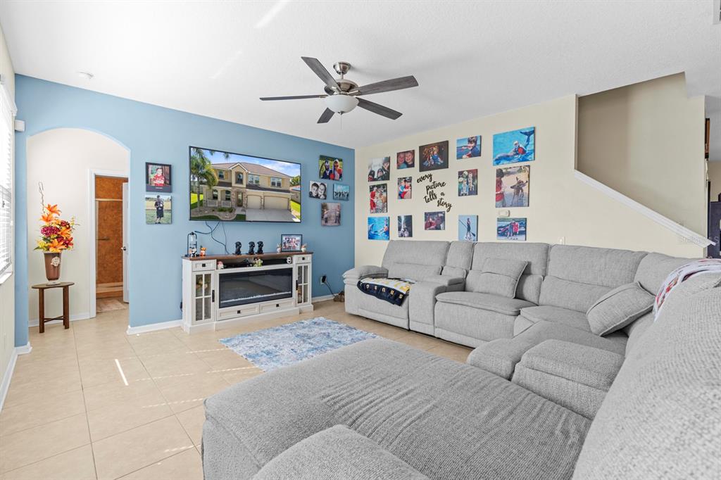 159 Star Shell Drive Apollo Beach, FL 33572 - Photo 25 of 57 a living room with furniture and a flat screen tv