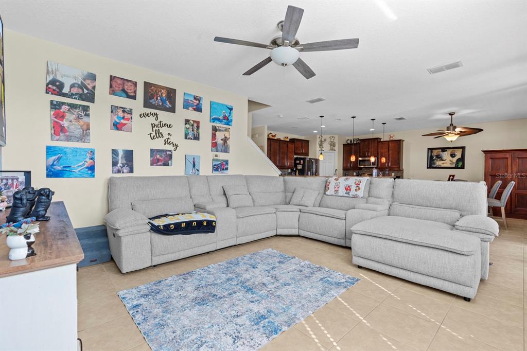 159 Star Shell Drive Apollo Beach, FL 33572 - Photo 27 of 57 a living room with furniture and a rug