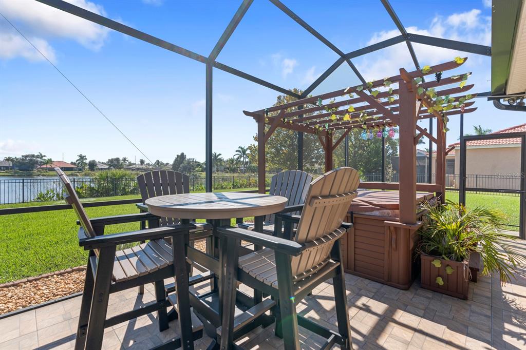 159 Star Shell Drive Apollo Beach, FL 33572 - Photo 56 of 57 a view of a table and chairs in patio