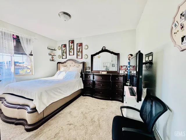 a white toilet sitting next to a shower curtain
