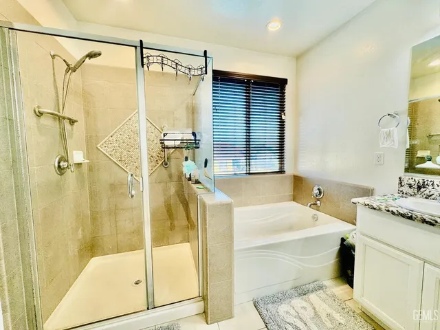 a view of living room with patio furniture and a large window