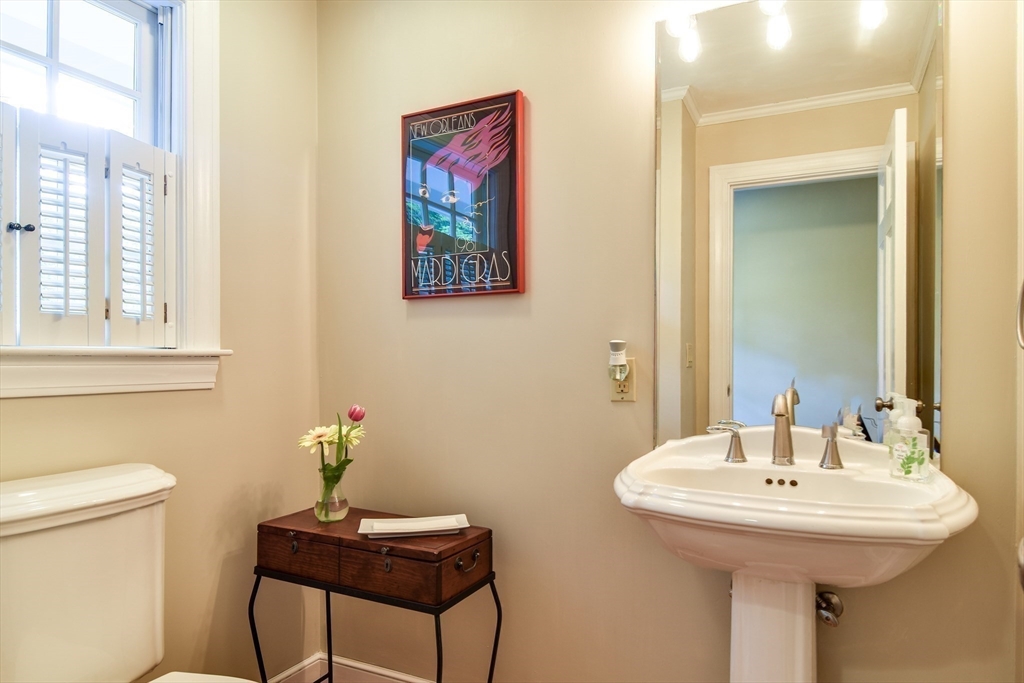 114 Hunters Ridge Road Concord, MA 01742 - Photo 16 of 38 a bathroom with a sink and a mirror