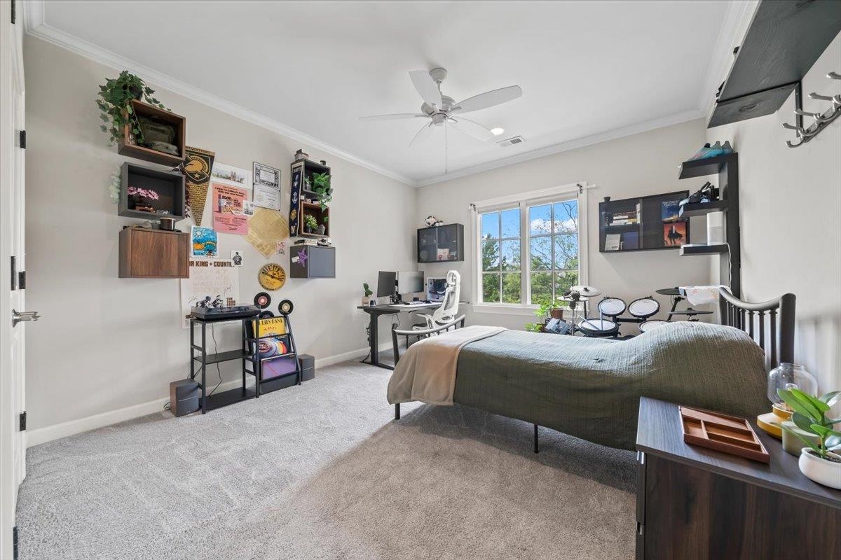 12335 Cascabel Lane Collierville, TN 38017 - Photo 25 of 38 a bedroom with bed and a window