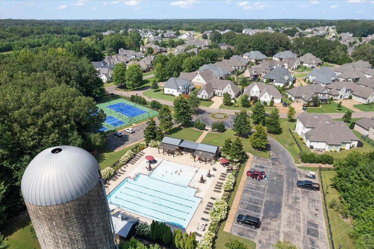 12335 Cascabel Lane Collierville, TN 38017 - Photo 35 of 38 an aerial view of a house with a garden and lake view