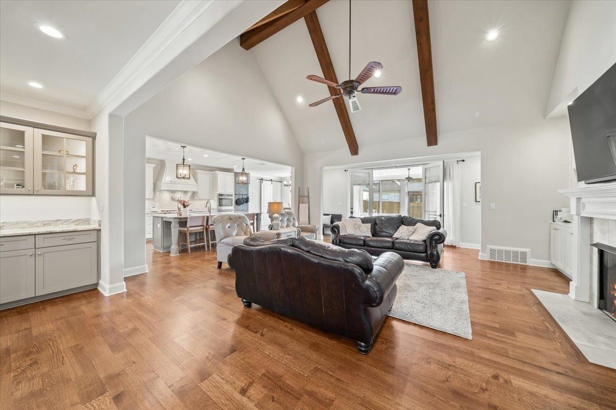 12335 Cascabel Lane Collierville, TN 38017 - Photo 7 of 38 a living room with furniture and a flat screen tv
