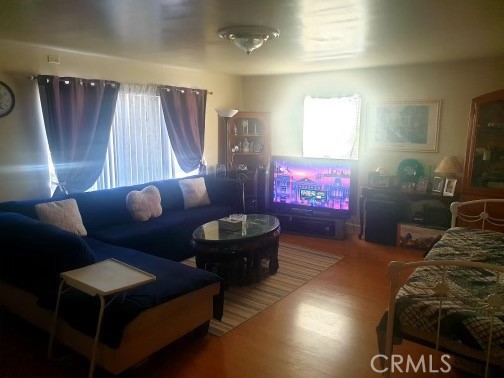 1363 Walnut Canyon Road Moorpark, CA 93021 - Photo 3 of 7 a living room with furniture and a flat screen tv