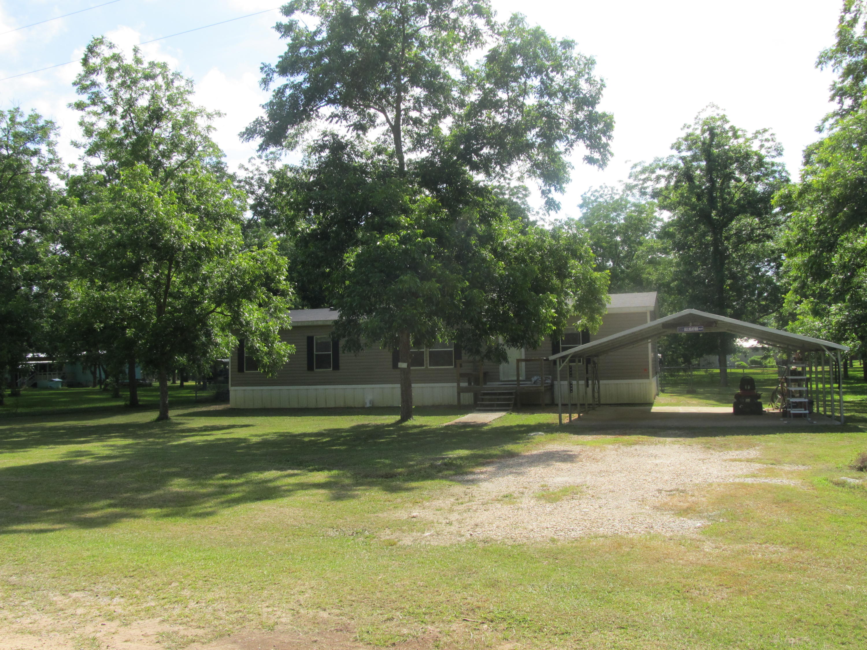 32114 Office Road Dozier, AL 36028 - Photo 20 of 24 a swimming pool with trees in the background