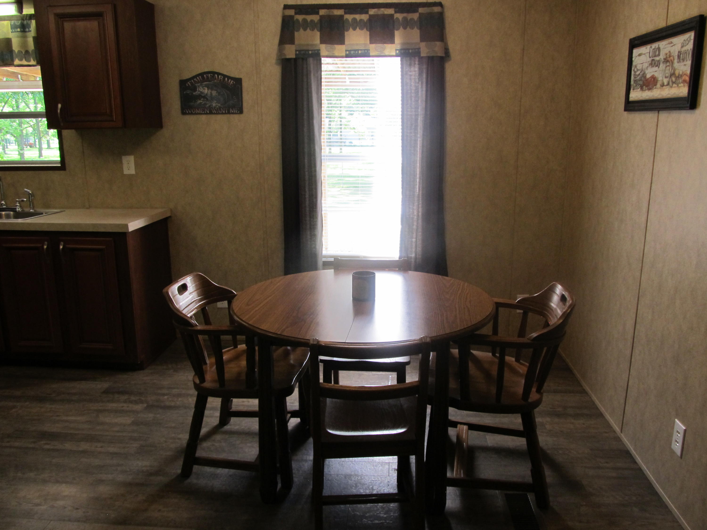 32114 Office Road Dozier, AL 36028 - Photo 8 of 24 a dining room with furniture and window