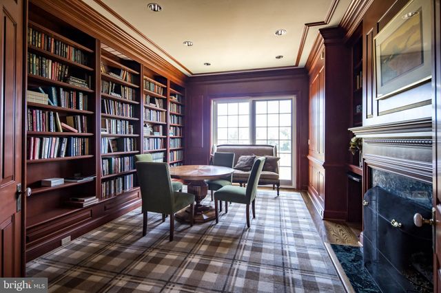 a front view of a house with swimming pool