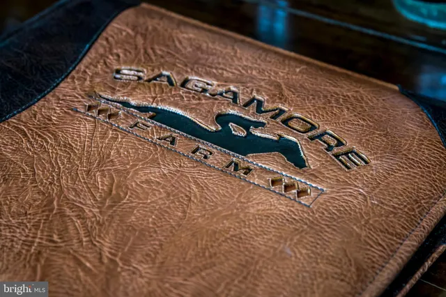 a bedroom with a bed and a wall painting