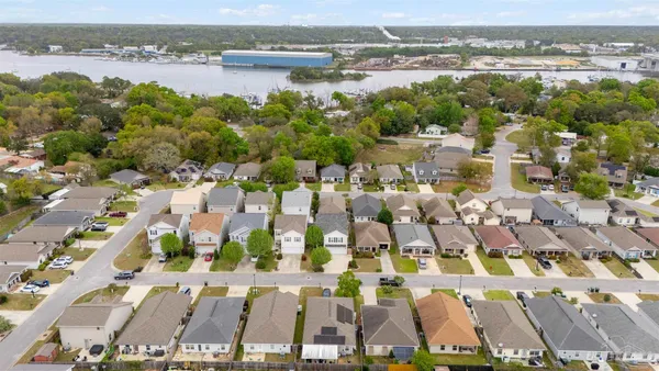 an aerial view of residential building and lake view