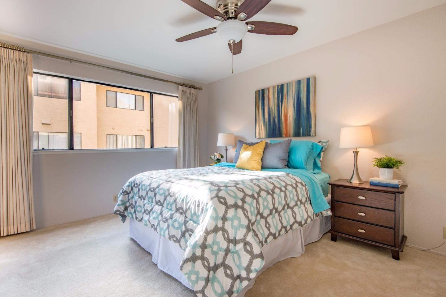 20666 Celeste Circle Cupertino, CA 95014 - Photo 12 of 15 a bedroom with a bed and window