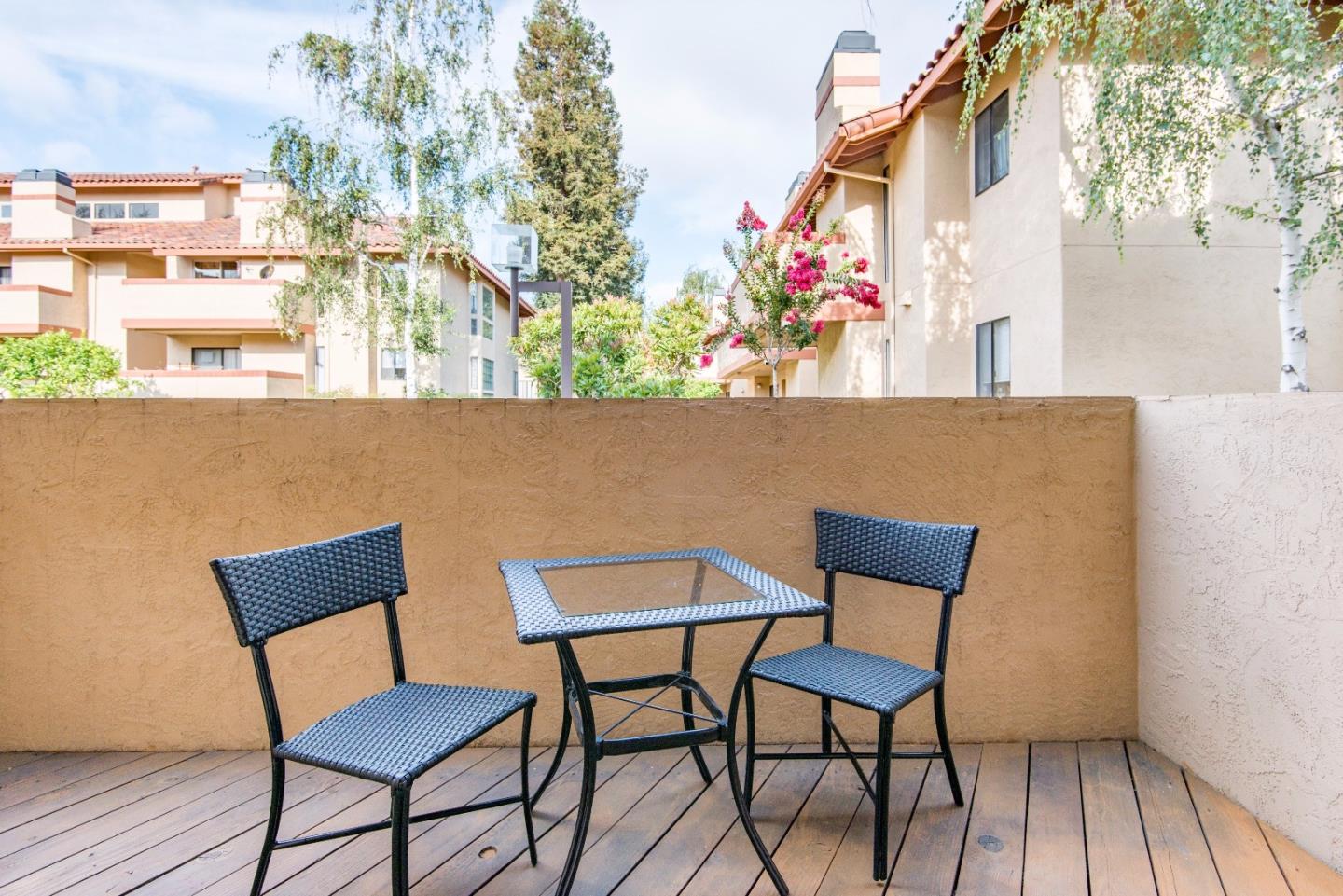 20666 Celeste Circle Cupertino, CA 95014 - Photo 14 of 15 a view of chair and table in wooden floor