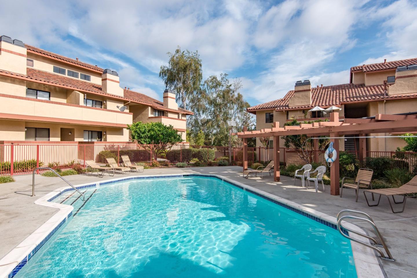 20666 Celeste Circle Cupertino, CA 95014 - Photo 15 of 15 a view of a house with swimming pool and sitting area