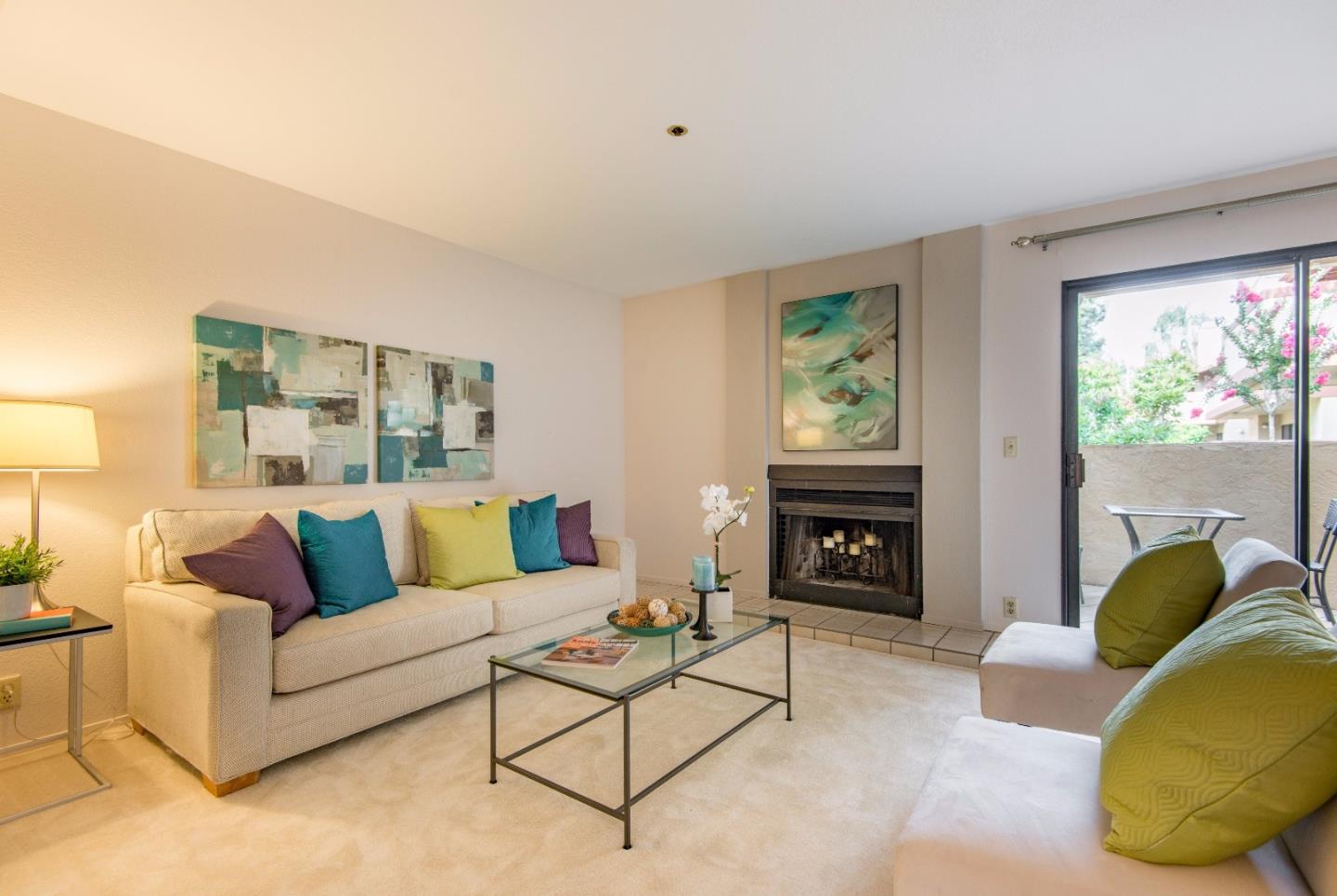 20666 Celeste Circle Cupertino, CA 95014 - Photo 3 of 15 a living room with furniture and a fireplace