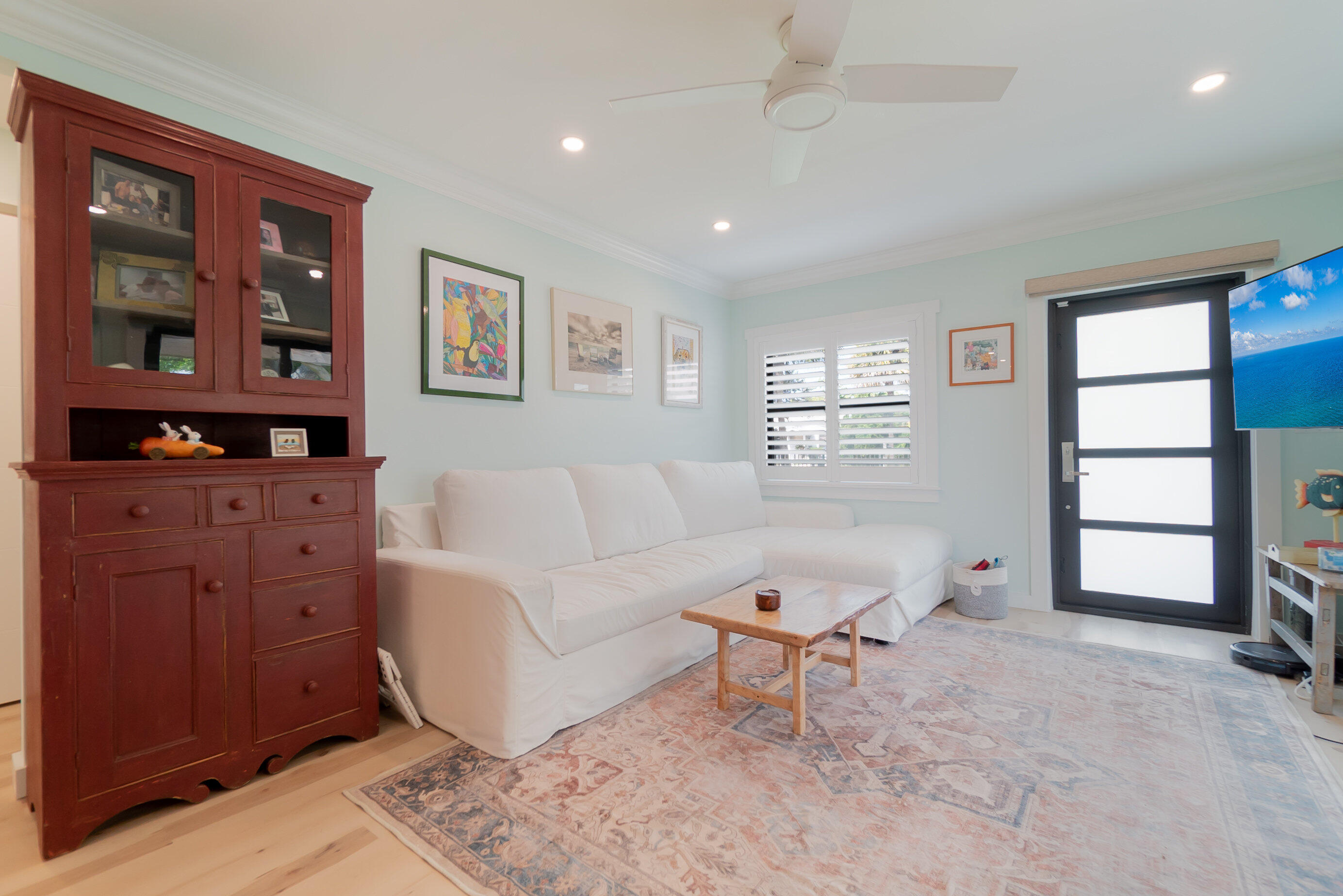 301 South Swinton Avenue Delray Beach, FL 33444 - Photo 11 of 29 a living room with furniture and entry gate