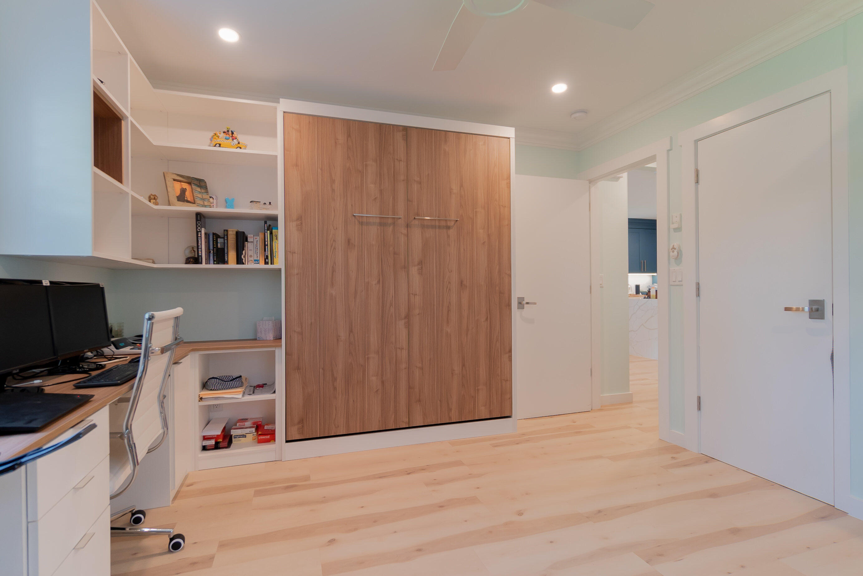 301 South Swinton Avenue Delray Beach, FL 33444 - Photo 17 of 29 a view of a kitchen with fridge and workspace