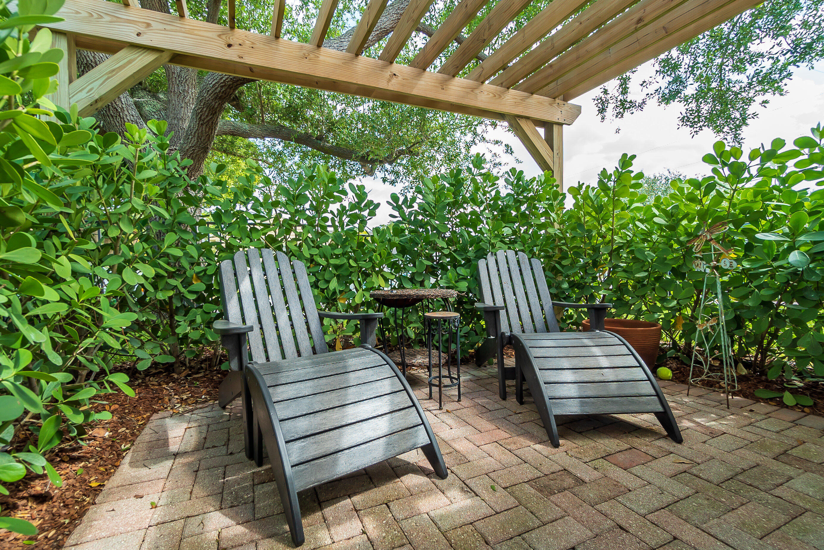 301 South Swinton Avenue Delray Beach, FL 33444 - Photo 21 of 29 a view of outdoor space with garden and patio