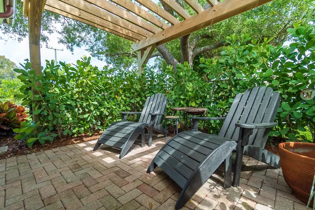 a view of a swimming pool with a patio
