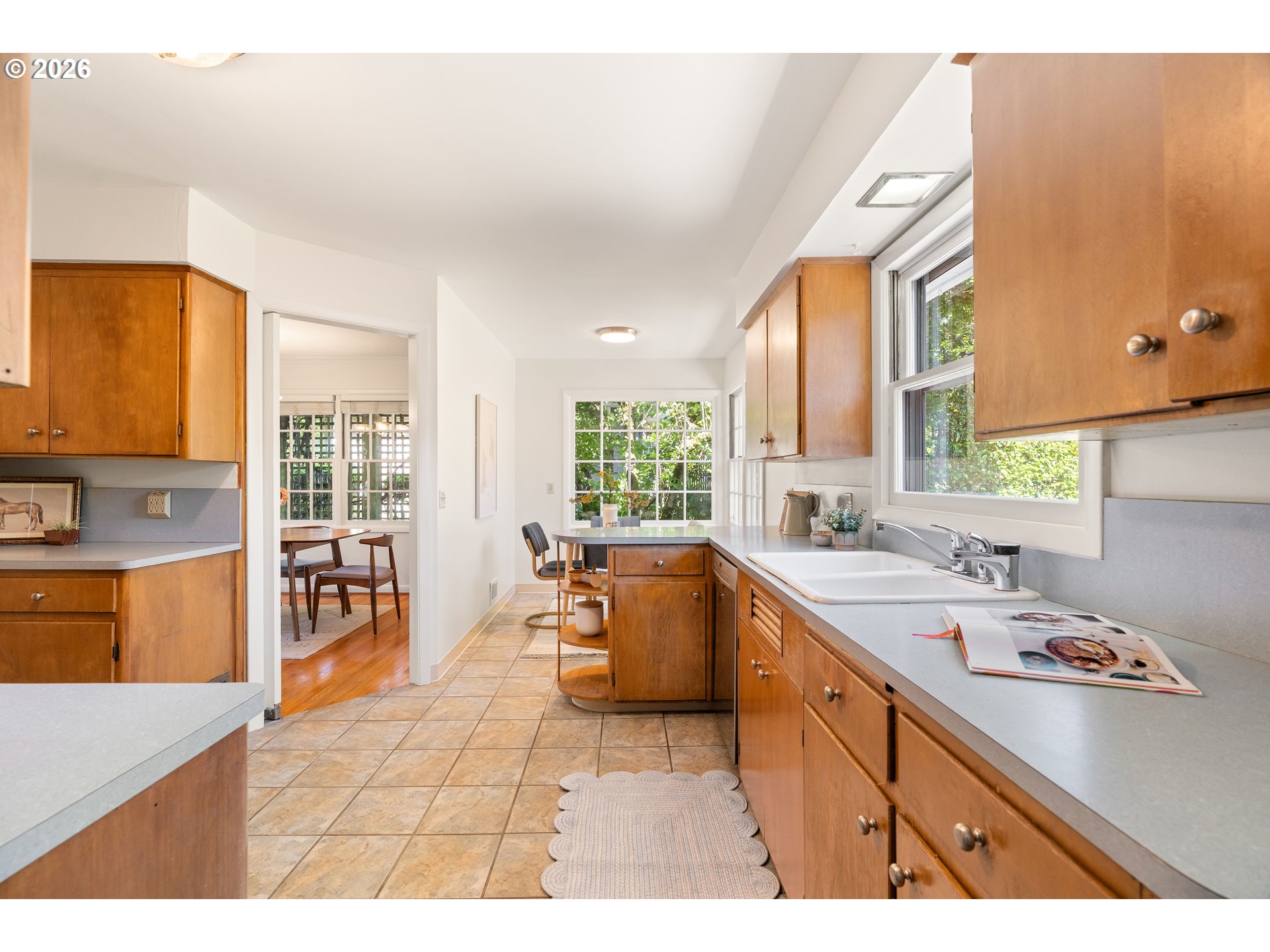 7541 Northeast Alameda Street Portland, OR 97213 - Photo 8 of 35 a large kitchen with a large window and counter top space
