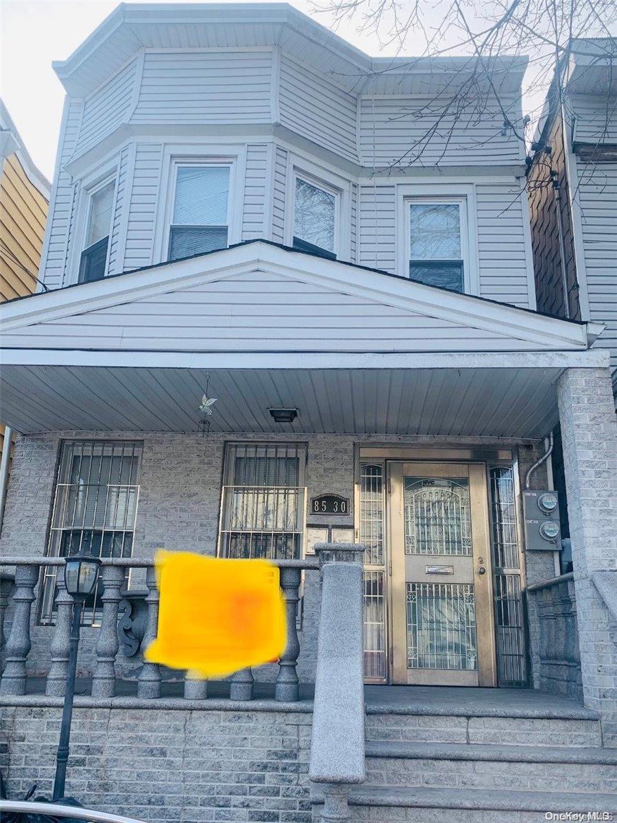 85-30 79th Street Queens, NY 11421 - Photo 1 of 23 a view of a building with a swimming pool