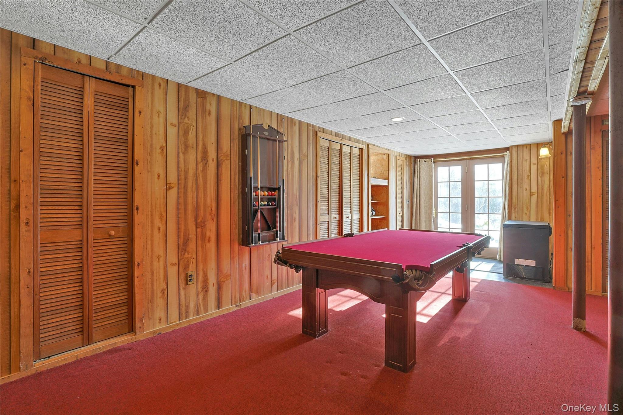 31 Powder Horn Road Cortlandt Manor, NY 10567 - Photo 26 of 38 a view of a big room with furniture window and outside view