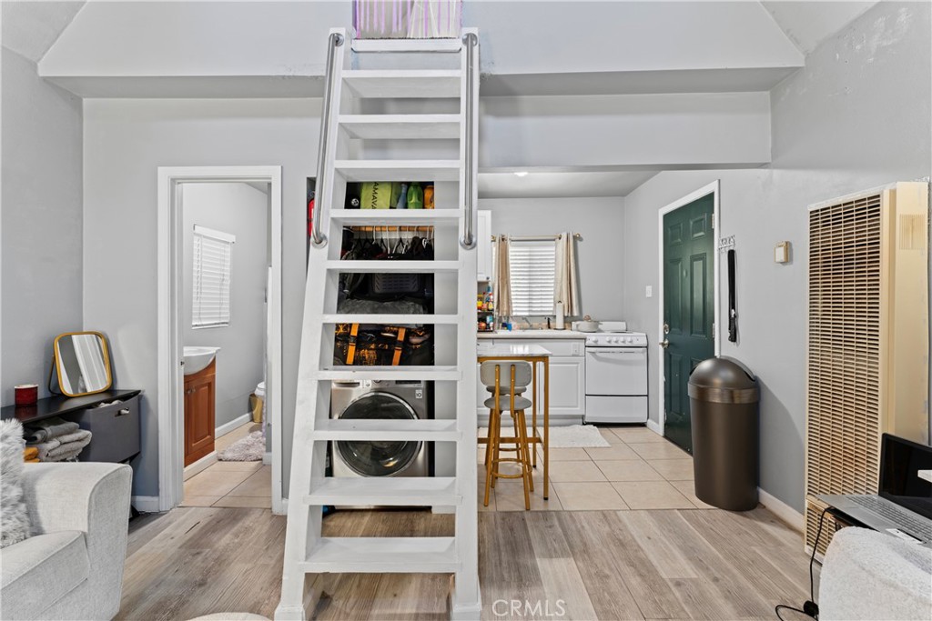 1286 Lovers Lane Rimforest, CA 92378 - Photo 16 of 27 a view of walk in closet with clothes and shoes