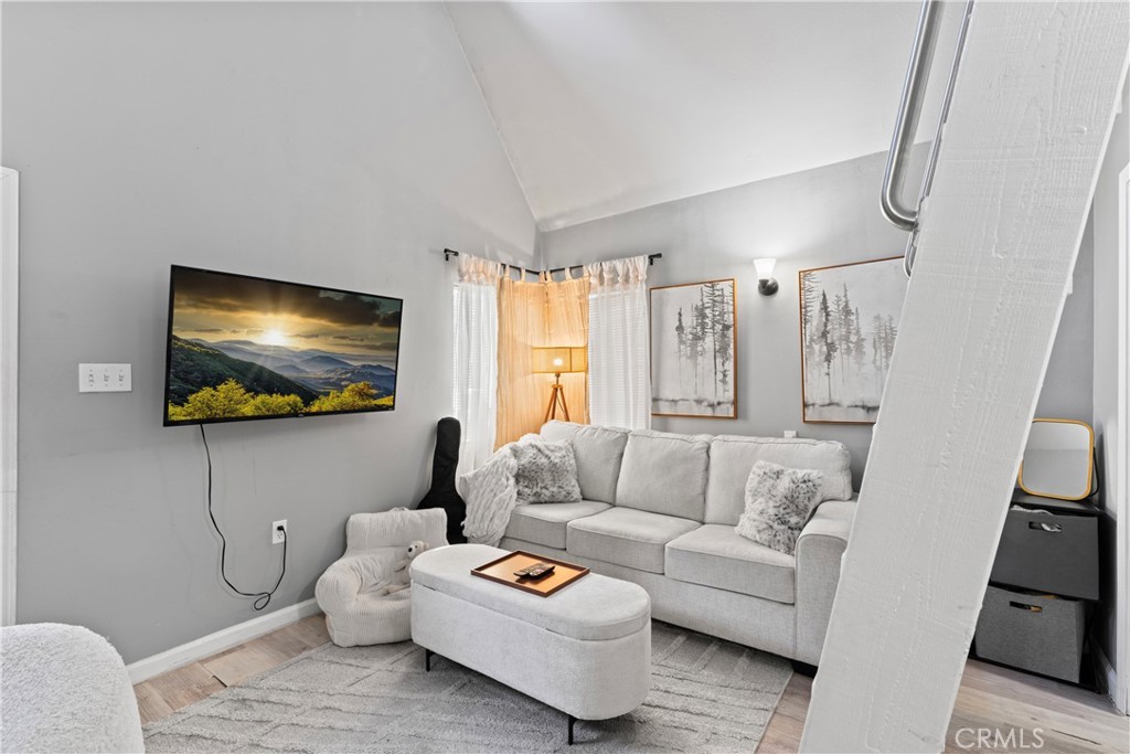 1286 Lovers Lane Rimforest, CA 92378 - Photo 20 of 27 a living room with furniture and a flat screen tv