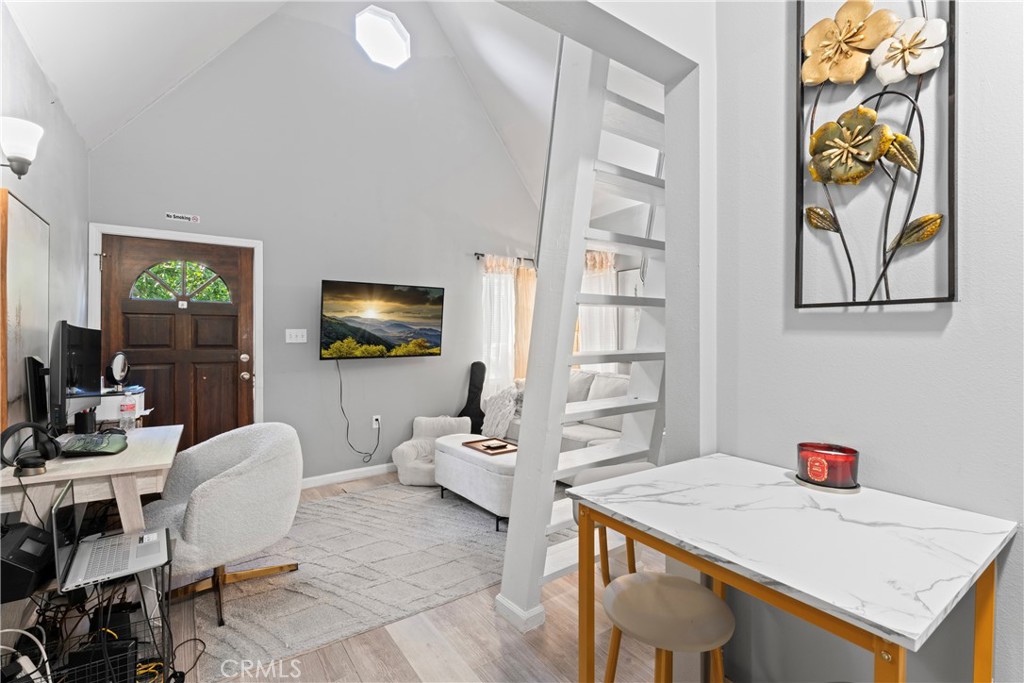 1286 Lovers Lane Rimforest, CA 92378 - Photo 21 of 27 a living room with furniture and a flat screen tv