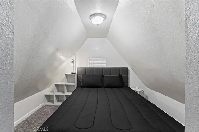 a kitchen with a white cabinets sink and white appliances