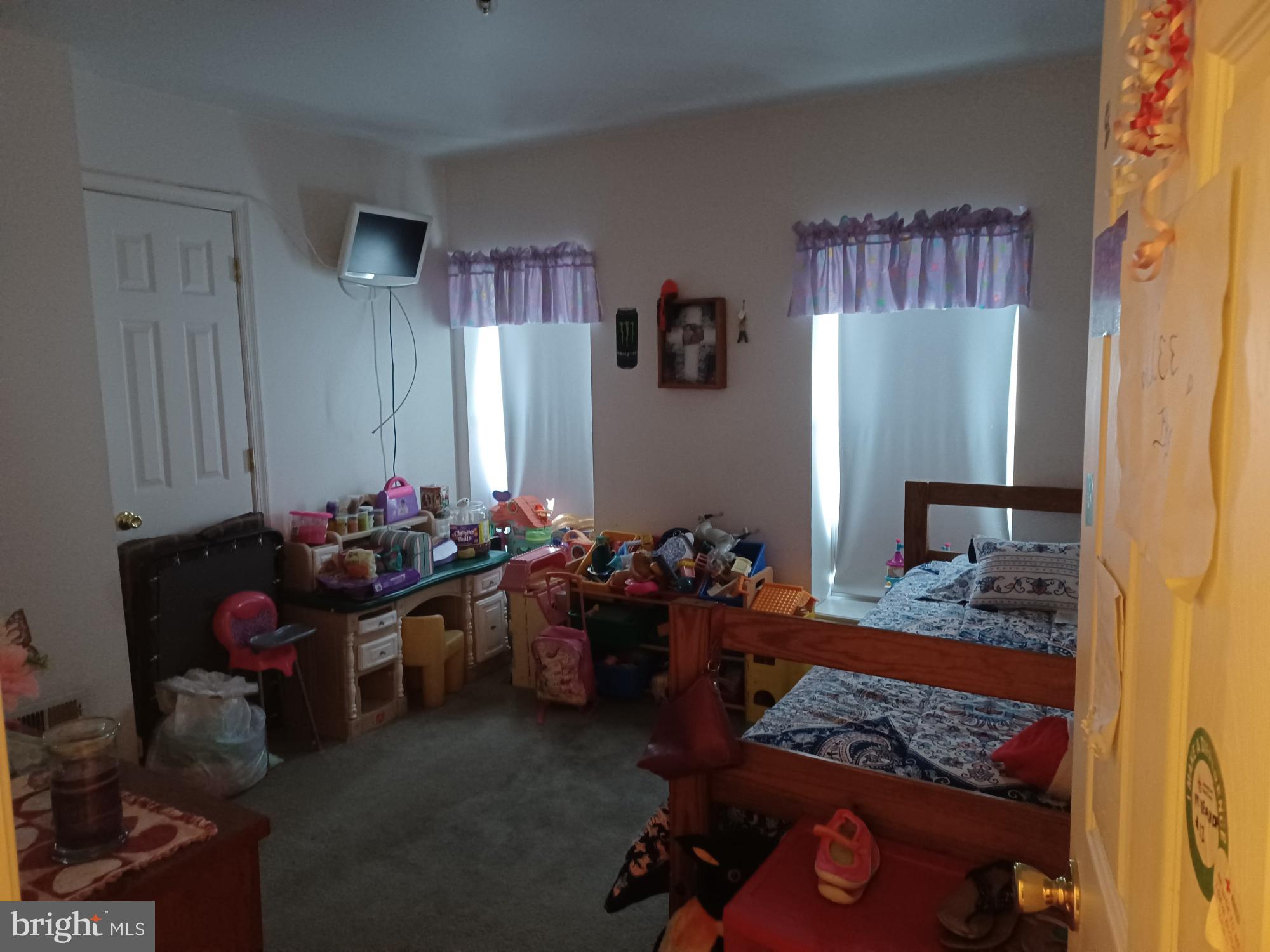 2409 Hammonds Ferry Road Halethorpe, MD 21227 - Photo 7 of 10 a room with lots of different colored cloths