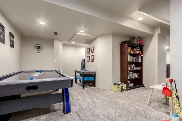 a room with furniture and white walls