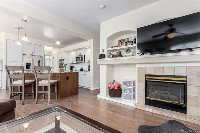 a open kitchen view with cabinets a sink and appliances