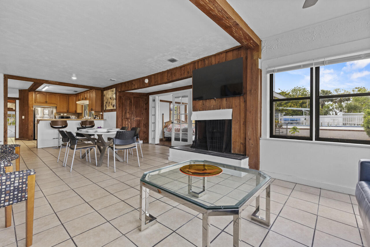 14601 Orange Avenue Fort Pierce, FL 34945 - Photo 14 of 37 a view of a livingroom with furniture and a fireplace