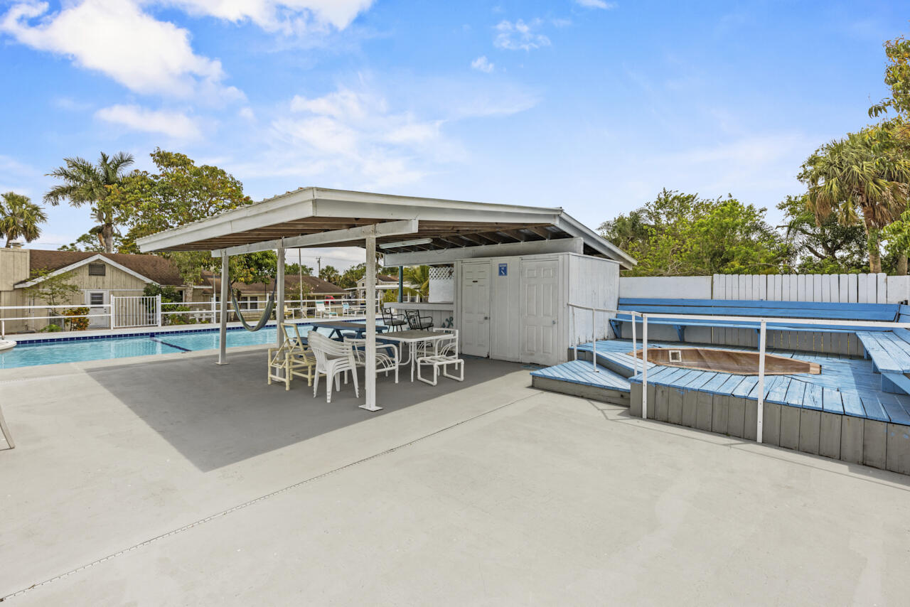 14601 Orange Avenue Fort Pierce, FL 34945 - Photo 25 of 37 a view of a terrace with chairs