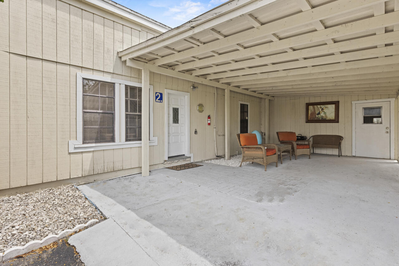 14601 Orange Avenue Fort Pierce, FL 34945 - Photo 28 of 37 a living room with furniture and a window