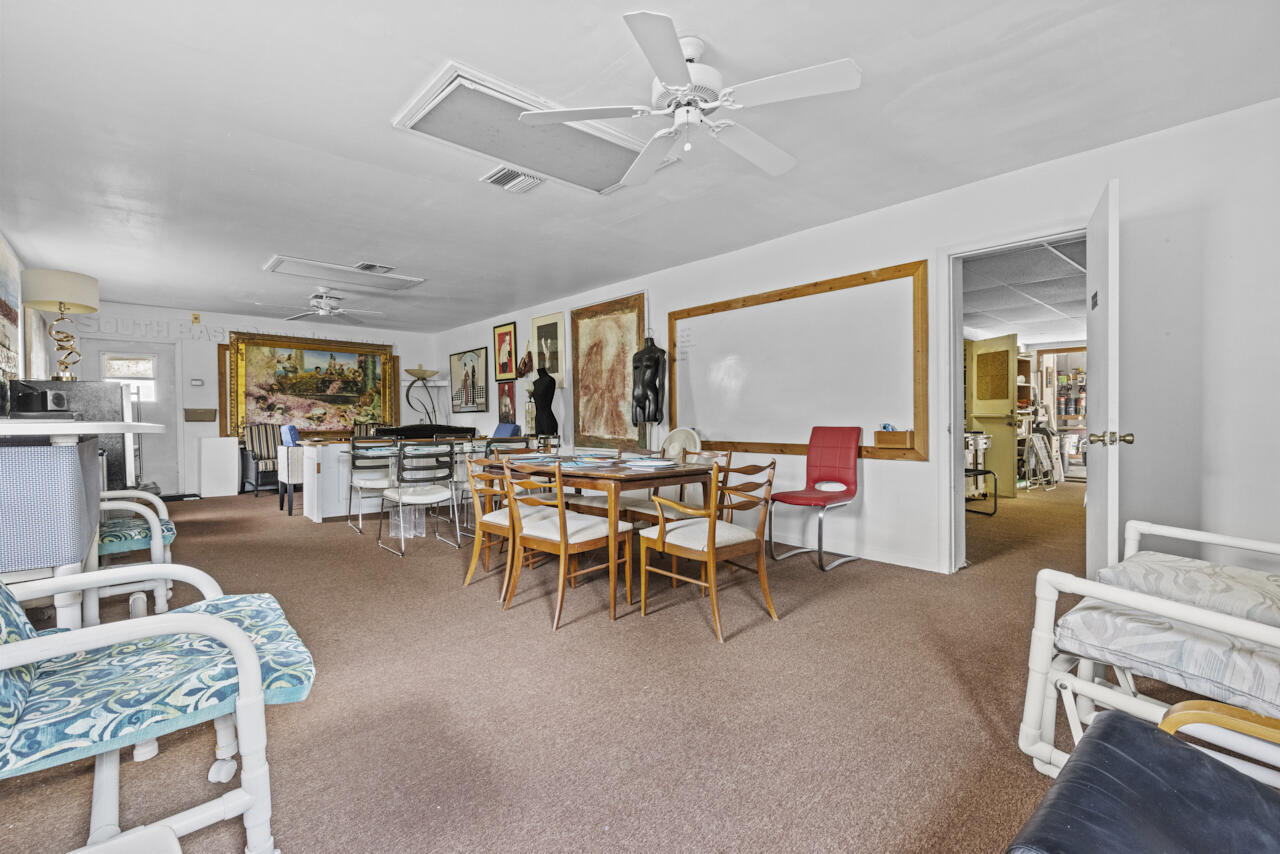 14601 Orange Avenue Fort Pierce, FL 34945 - Photo 30 of 37 a living room with furniture and kitchen view