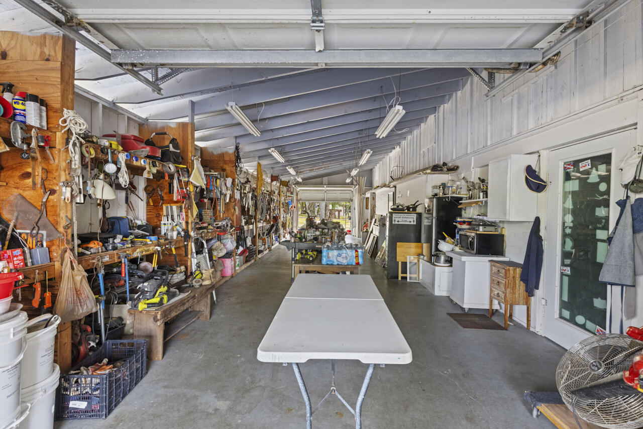 14601 Orange Avenue Fort Pierce, FL 34945 - Photo 32 of 37 a view of a room with gym equipment