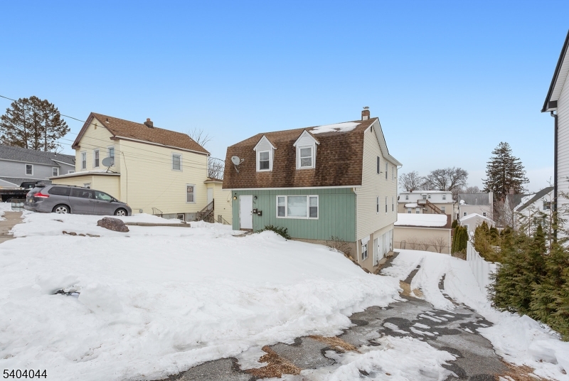 223 Liberty Street, Unit 2 Boonton, NJ 07005 - Photo 22 of 22 a view of a house with a snow