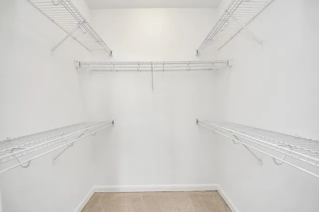 a view of small space with racks on the wall
