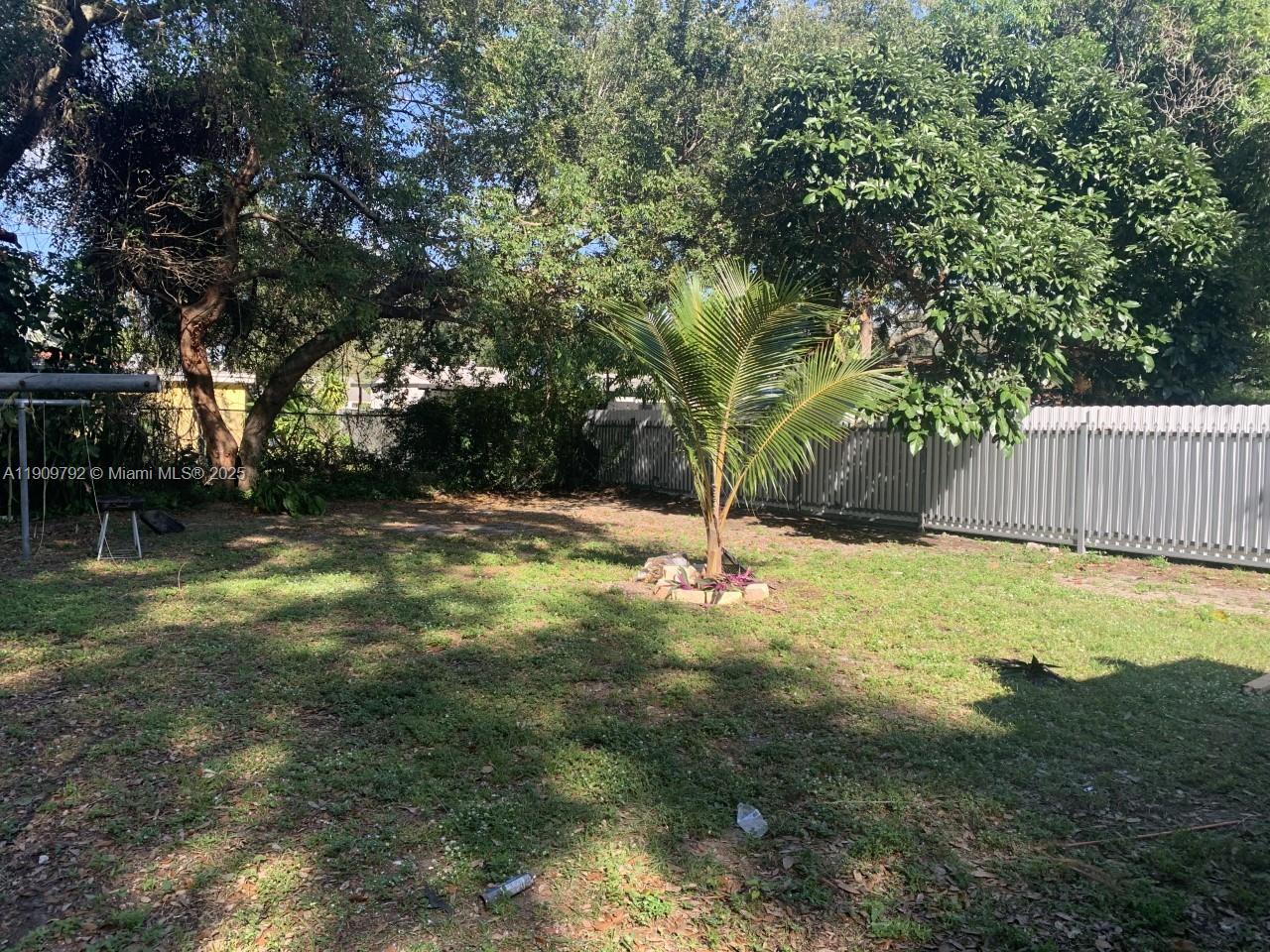 2181 Northwest 91st Street Miami, FL 33147 - Photo 14 of 14 a view of swimming pool with a yard