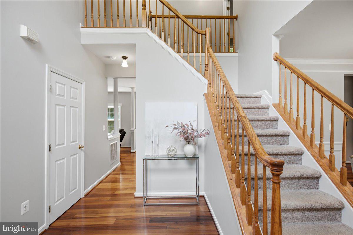 2424 Springbrook Court Huntingtown, MD 20639 - Photo 10 of 103 a view of entryway and hall with wooden floor