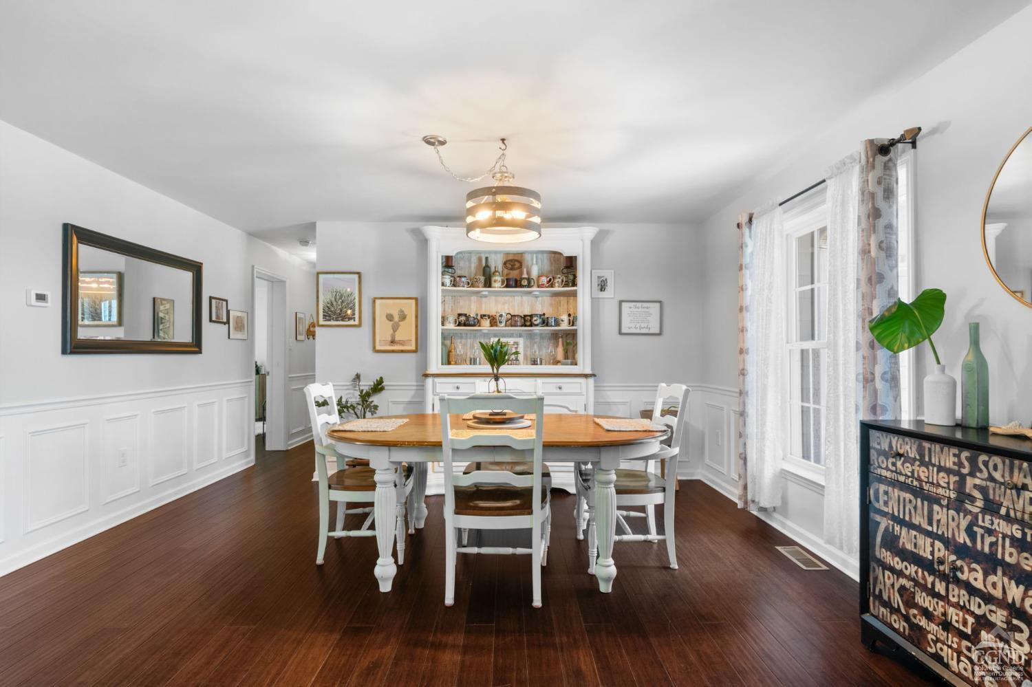 174 Grove School Road Catskill, NY 12414 - Photo 11 of 52 a view of a dining room with furniture wooden floor and chandelier