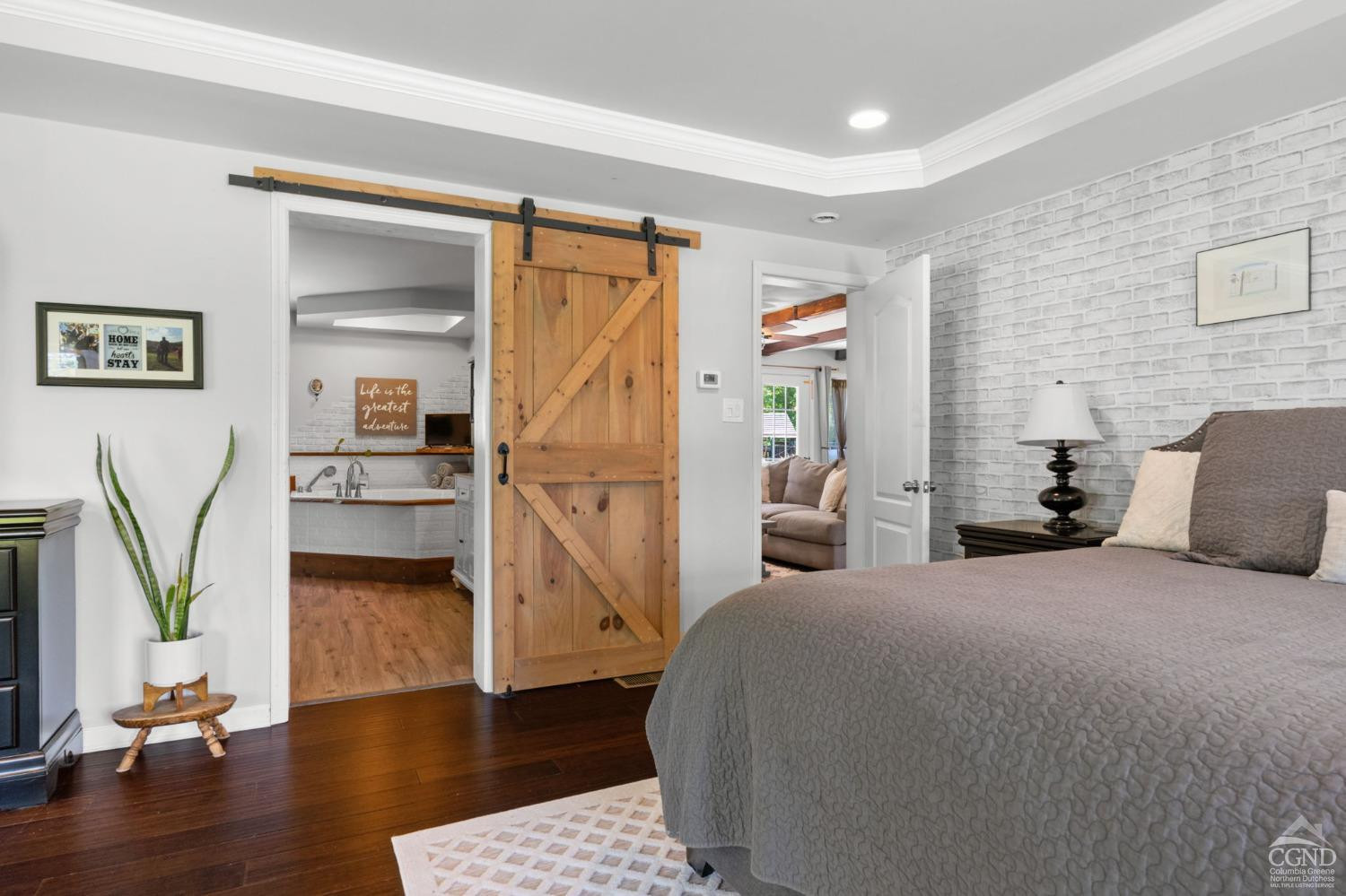 174 Grove School Road Catskill, NY 12414 - Photo 16 of 52 a bedroom with a bed and wooden floor