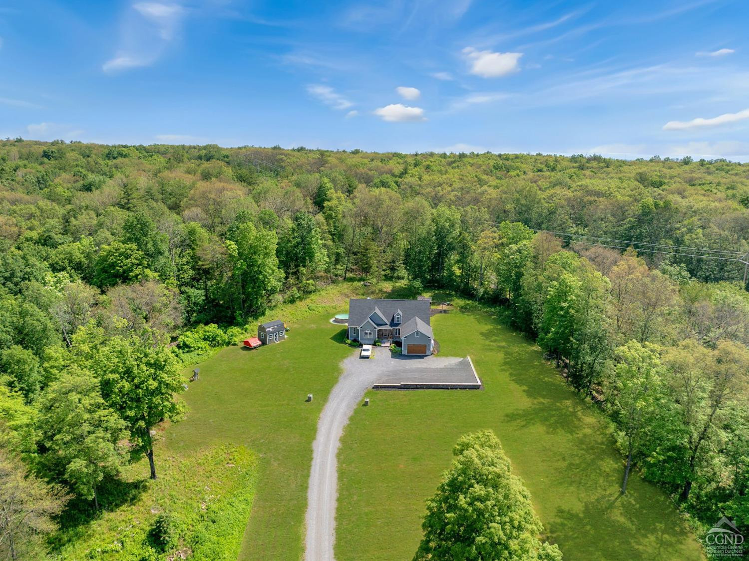 174 Grove School Road Catskill, NY 12414 - Photo 40 of 52 a view of a city with lush green forest