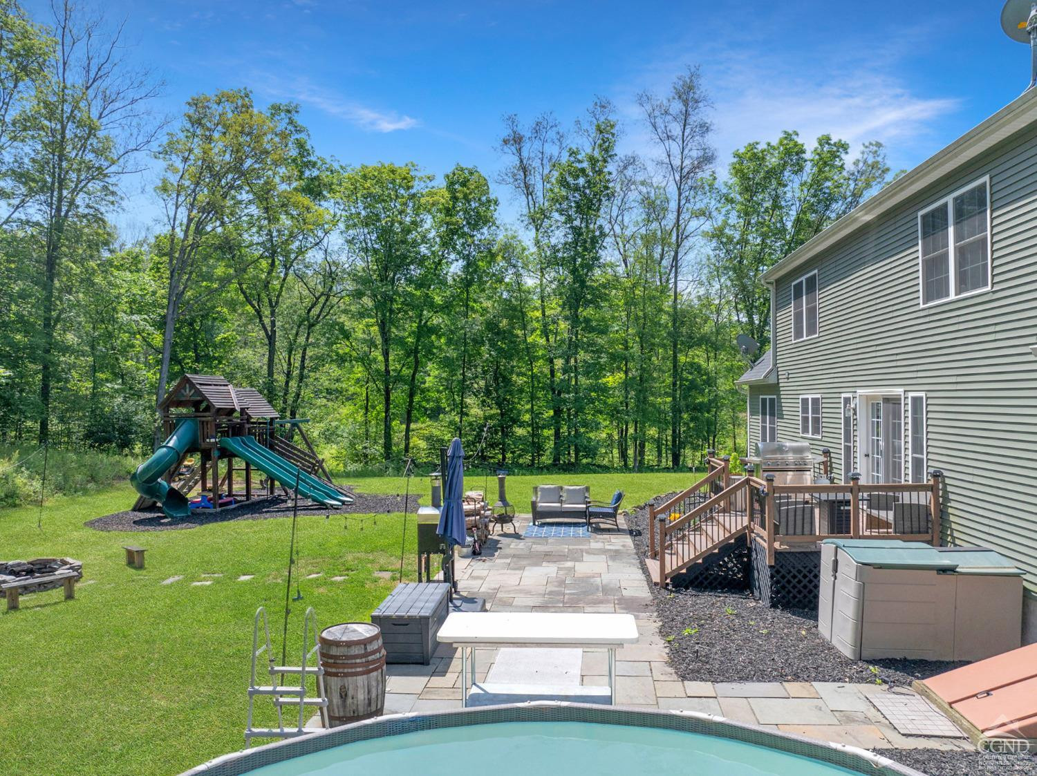 174 Grove School Road Catskill, NY 12414 - Photo 42 of 52 a view of a garden with a slide