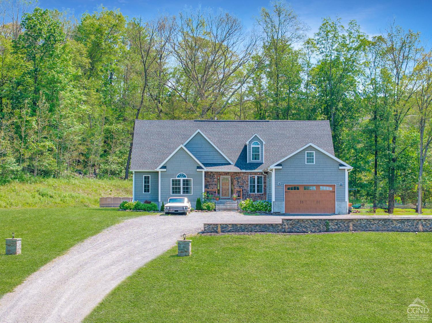 174 Grove School Road Catskill, NY 12414 - Photo 44 of 52 front view of a house with a yard